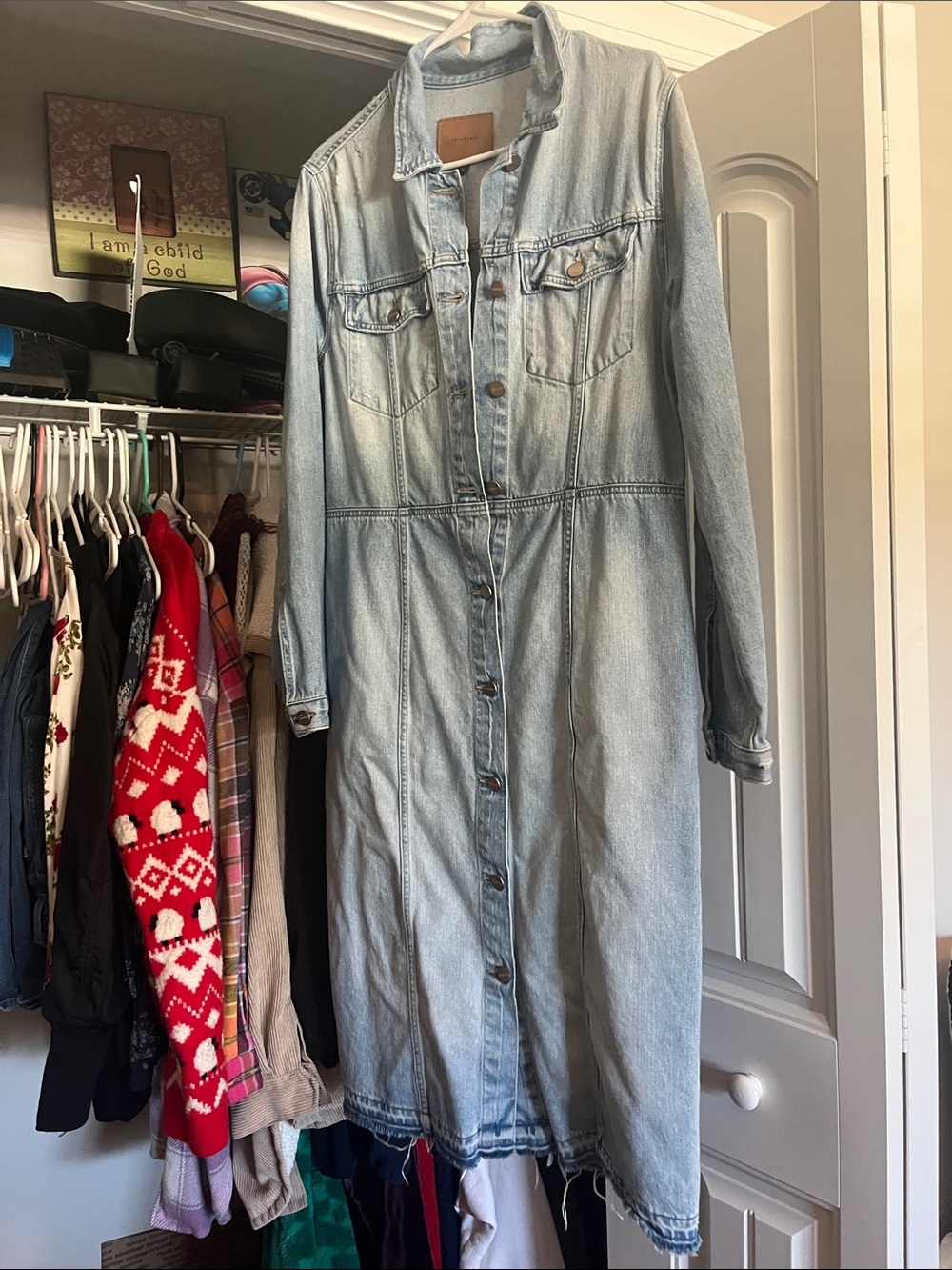 Jean dress/ jacket full length button down with waist loops for belt has pockets